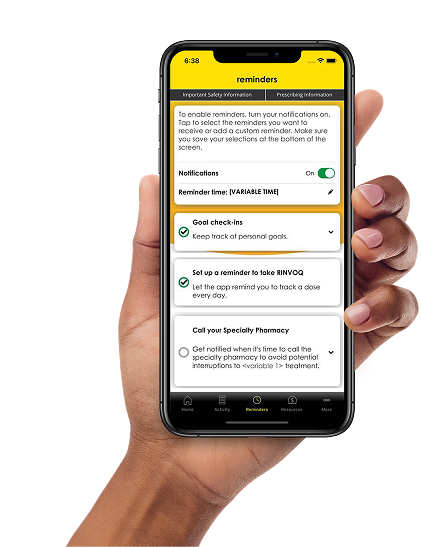 Hand holding a phone that shows a page of the RINVOQ Complete app with reminders