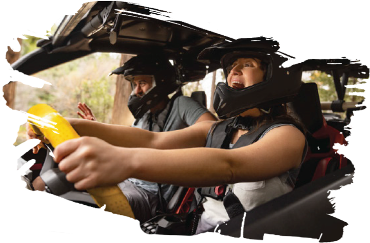 People in an ATV
